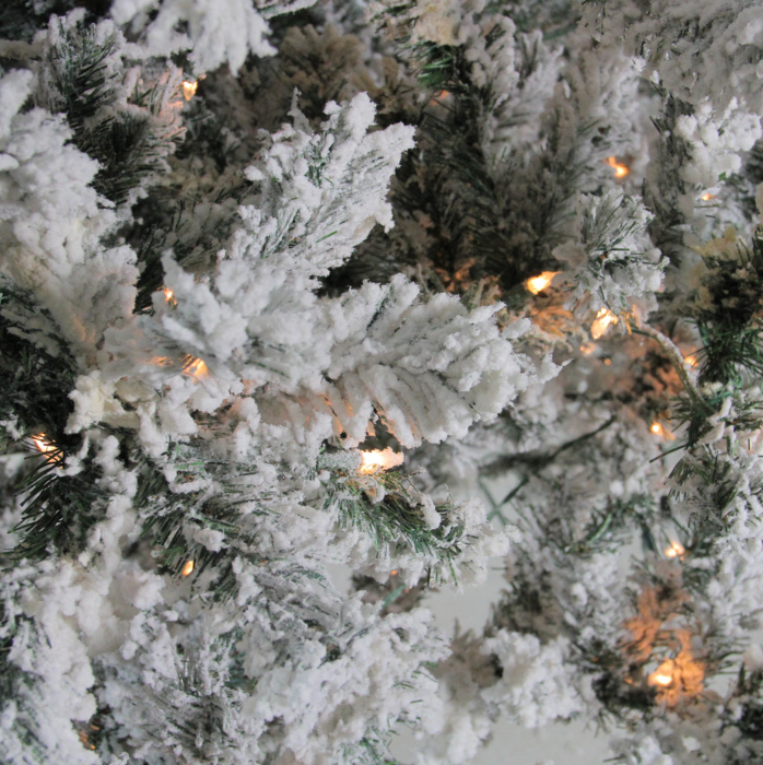 Heavily Flocked Pine Lifelike Tree
